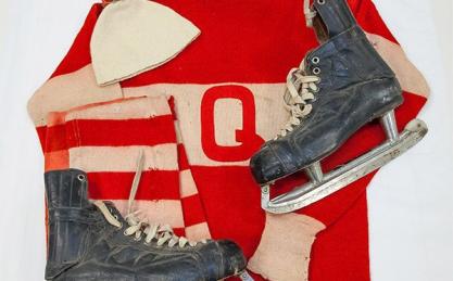 old hockey uniform and skates